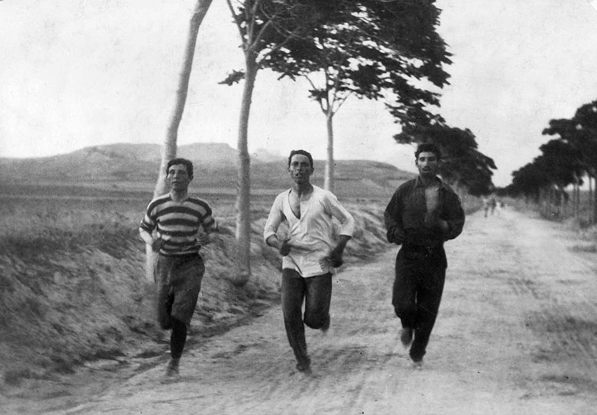 Three athletes in training for the marathon race of the 1896 Athens Olympic Games, on the road from Marathon to Athens - Burton Holmes photo