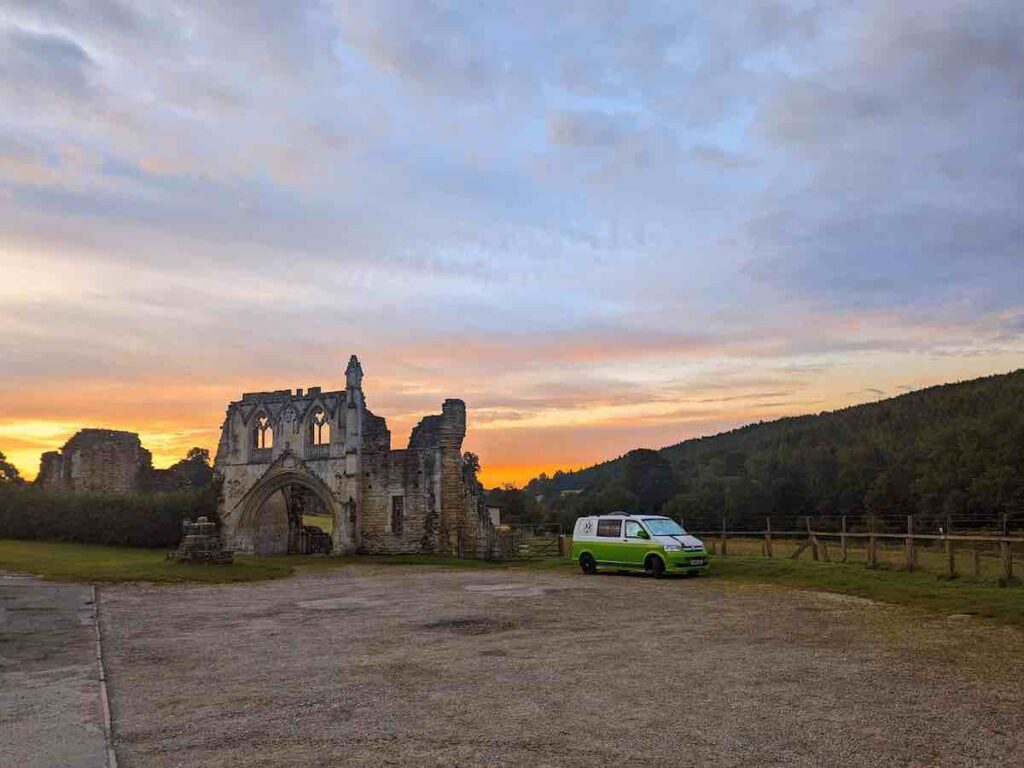 Kirkham Priory free car park - with a campervan camping overnight against a majestic sunrise