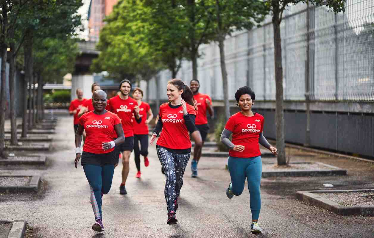 Running charity GoodGym volunteer runners in their branded t-shirts